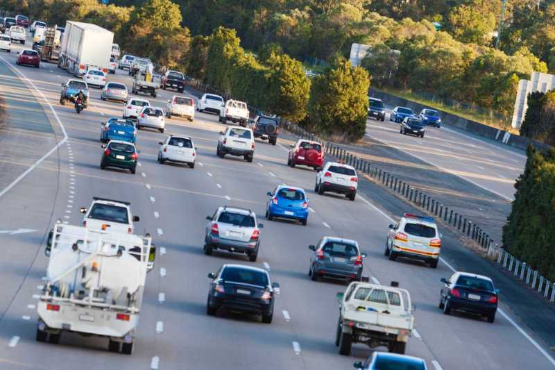 emergency preparedness for leaving home shown by busy freeway